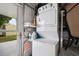 Convenient laundry area featuring a stacked washer and dryer set, ready for your laundry needs at 5238 Vera St, Zephyrhills, FL 33542