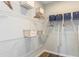 Walk-in closet fitted with wire shelving and storage bins for efficient organization at 6206 Timberdale Ave, Wesley Chapel, FL 33545