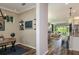 Open concept office, kitchen and living area with ample space for entertaining and relaxing at 6206 Timberdale Ave, Wesley Chapel, FL 33545