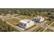 Aerial view highlighting modern townhomes with well-maintained landscaping and community amenities at 6207 64Th N Way, Pinellas Park, FL 33781