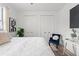 Cozy bedroom with a plush bed, closet doors, contemporary decor, and plenty of natural light at 6207 64Th N Way, Pinellas Park, FL 33781