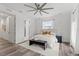 Well-lit bedroom with neutral tones, plush bedding, and contemporary furniture at 6207 64Th N Way, Pinellas Park, FL 33781