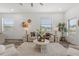 Cozy living room with neutral furniture, warm lighting, and tasteful decor, creating a welcoming and relaxing space at 6207 64Th N Way, Pinellas Park, FL 33781