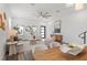 Elegant living room features modern decor, art, and windows with natural light, creating a comfortable atmosphere at 6207 64Th N Way, Pinellas Park, FL 33781