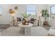 Comfortable living room featuring stylish decor, including a sofa, accent chairs, and a decorative coffee table at 6207 64Th N Way, Pinellas Park, FL 33781