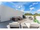 Spacious rooftop patio area featuring outdoor seating, lounge chairs and neighborhood views at 6207 64Th N Way, Pinellas Park, FL 33781