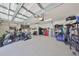 Spacious garage is equipped for a home gym and includes plenty of storage at 7328 Paradiso Dr, Apollo Beach, FL 33572