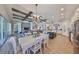 Spacious open-concept living and dining area offering a modern and inviting atmosphere for daily living and entertaining at 7328 Paradiso Dr, Apollo Beach, FL 33572