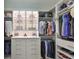 Spacious walk-in closet offering custom shelving, drawers, and organized storage solutions at 7328 Paradiso Dr, Apollo Beach, FL 33572