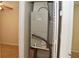 Utility closet featuring an HVAC system with easy access for maintenance at 7411 S Elliott St, Tampa, FL 33616