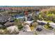 Expansive aerial view of a home with a private pool, rooftop terrace marked with a red marker at 7425 Terrace River Dr, Temple Terrace, FL 33637
