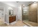 Bathroom with a glass shower, granite vanity, tile flooring, and neutral wall color at 7425 Terrace River Dr, Temple Terrace, FL 33637