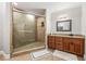 Bathroom with a glass shower, granite vanity, tile flooring, and neutral wall color at 7425 Terrace River Dr, Temple Terrace, FL 33637