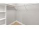Empty closet with wire shelving and white trim at 7425 Terrace River Dr, Temple Terrace, FL 33637