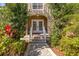 Inviting front entrance with double doors and manicured landscaping at 7425 Terrace River Dr, Temple Terrace, FL 33637