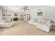 Inviting living room with stone fireplace, built-in shelving, and neutral furnishings at 7425 Terrace River Dr, Temple Terrace, FL 33637