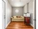 Cozy office space with hardwood floors, a sofa, and a small window at 7425 Terrace River Dr, Temple Terrace, FL 33637