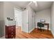 Office space with wood floors and a desk at 7425 Terrace River Dr, Temple Terrace, FL 33637