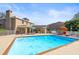 Beautiful in-ground swimming pool with patio, outdoor kitchen, and view of the home at 7425 Terrace River Dr, Temple Terrace, FL 33637