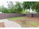 Large, fenced backyard with a brick paver patio at 800 51St S St, Gulfport, FL 33707