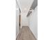 Walk-in closet with sliding door and built in shelving, near the bathroom at 800 51St S St, Gulfport, FL 33707