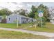 Well-maintained home with fresh paint and a vibrant green lawn at 800 51St S St, Gulfport, FL 33707