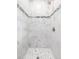 Modern shower with stylish tile and pebble flooring at 800 51St S St, Gulfport, FL 33707