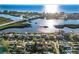 Stunning aerial image of the residential area and waterfront, capturing scenic views and community layout at 8083 Bayhaven Dr, Seminole, FL 33776