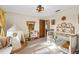 Bright bedroom featuring a crib, tent, and neutral tones at 8083 Bayhaven Dr, Seminole, FL 33776