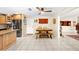 Open kitchen layout with a large dining table and access to the living room at 8083 Bayhaven Dr, Seminole, FL 33776
