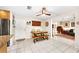 View of the dining area with access to the living room and kitchen at 8083 Bayhaven Dr, Seminole, FL 33776
