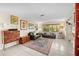Bright living room showcasing a stylish rug and comfortable seating arrangement at 8083 Bayhaven Dr, Seminole, FL 33776