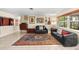 Inviting living room featuring stylish furnishings, decor, and a large window with natural light at 8083 Bayhaven Dr, Seminole, FL 33776