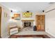Living room featuring a brick fireplace and a comfortable sitting area at 8083 Bayhaven Dr, Seminole, FL 33776