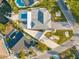 Aerial view highlighting the backyard pool, waterfront access, and the surrounding neighborhood at 1029 Bal Harbour Dr, Apollo Beach, FL 33572