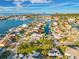 Aerial view highlighting waterfront location and neighborhood, showcasing easy water access at 1029 Bal Harbour Dr, Apollo Beach, FL 33572