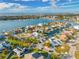 Beautiful aerial shot of the property in a waterfront neighborhood with canals and access to open water at 1029 Bal Harbour Dr, Apollo Beach, FL 33572
