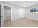 Bedroom view with closet and sleek ceiling fan at 1029 Bal Harbour Dr, Apollo Beach, FL 33572