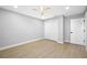 An empty bedroom featuring white walls and a modern ceiling fan at 1029 Bal Harbour Dr, Apollo Beach, FL 33572
