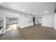 Open-concept living room with modern finishes, connecting bar, and bright spaces at 1029 Bal Harbour Dr, Apollo Beach, FL 33572