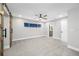 Spacious main bedroom featuring neutral walls, and a large walk-in closet and private bathroom at 1029 Bal Harbour Dr, Apollo Beach, FL 33572