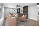 Cozy sitting area with custom cabinets, wine cooler, and comfortable seating at 1029 Bal Harbour Dr, Apollo Beach, FL 33572