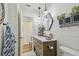 Modern bathroom featuring a vessel sink, elegant lighting, and stylish design elements at 110 Woods Landing Trl, Oldsmar, FL 34677