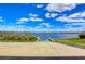Community boat ramp with a concrete launch leading into the tranquil waters of the adjacent lake at 11117 Abaco Island Ave, Riverview, FL 33579