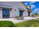 Clubhouse patio featuring umbrella-covered tables and seating for outdoor relaxation at 11117 Abaco Island Ave, Riverview, FL 33579
