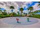 Community splash pad featuring colorful water features and lush landscaping under a bright, partly cloudy sky at 11117 Abaco Island Ave, Riverview, FL 33579