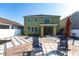 Relax in the backyard with outdoor seating and unique stone patterns at 11539 Tangle Branch Ln, Gibsonton, FL 33534