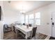 Bright dining room with natural light, complemented by stylish furnishings and decor at 11539 Tangle Branch Ln, Gibsonton, FL 33534