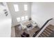 Spacious living room with high ceilings, large windows, and a comfortable sectional sofa, showcasing modern design at 11539 Tangle Branch Ln, Gibsonton, FL 33534