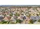 An aerial view showcases the community with well-maintained homes and manicured landscapes at 12222 Legacy Bright St, Riverview, FL 33578